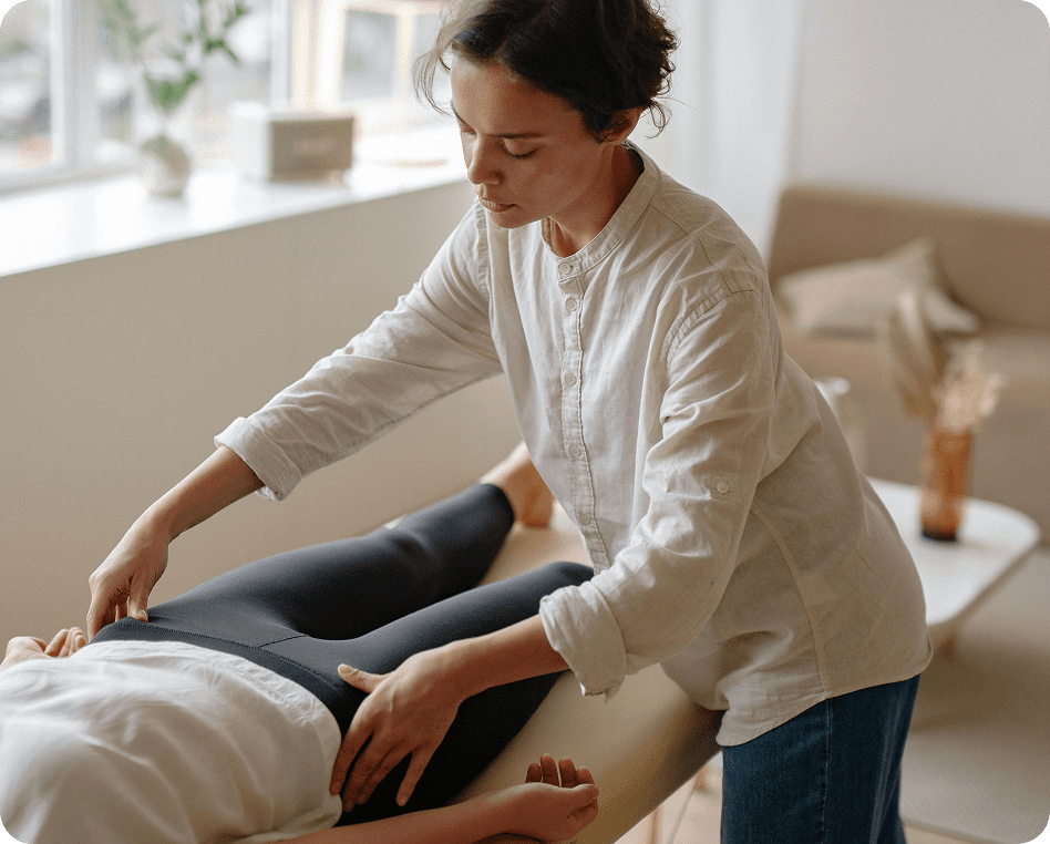 Therapist performing treatment on patient