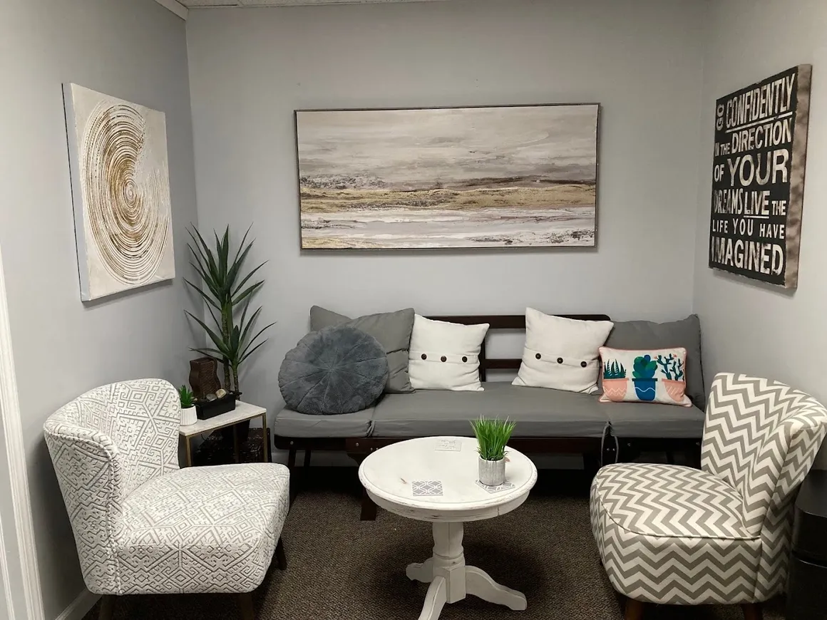 Comfortable seating area with artwork