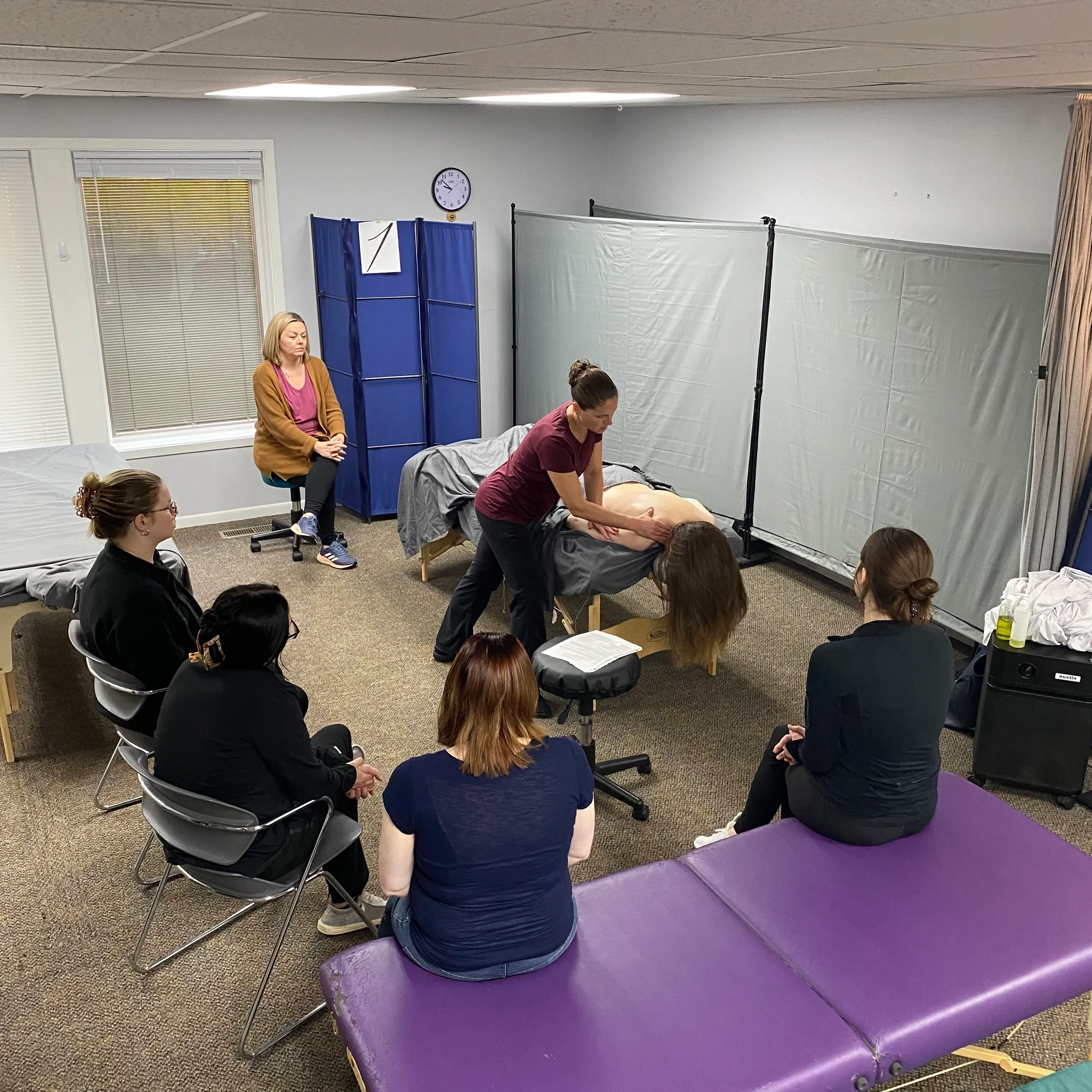 Massage therapy class demonstration